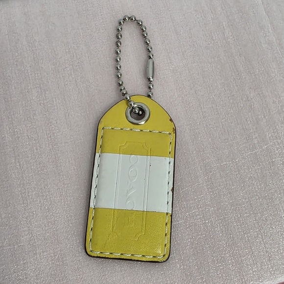Coach Handbags - Coach Two-Tone Yellow and White Hangtag Large- 3inch